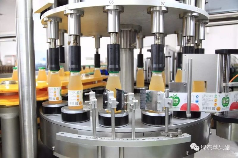 Fornecedor de etiquetadora rotativa de garrafa redonda chinesa com sistema de máquina de etiquetagem de prato giratório